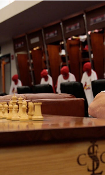 Cardinals bonding over chess in clubhouse